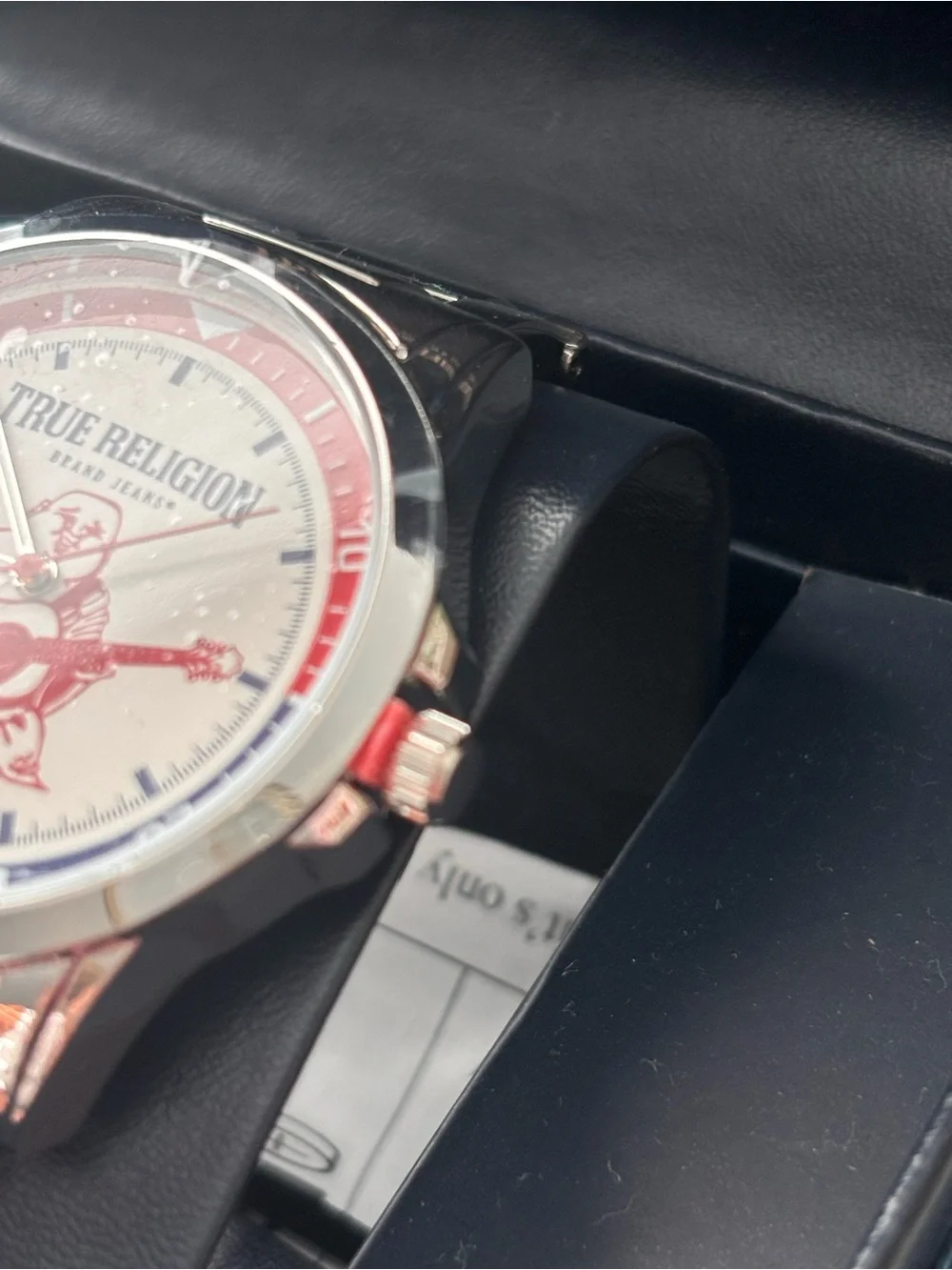 True Religion Men’s Silver Watch with Red and Blue Dial Accents